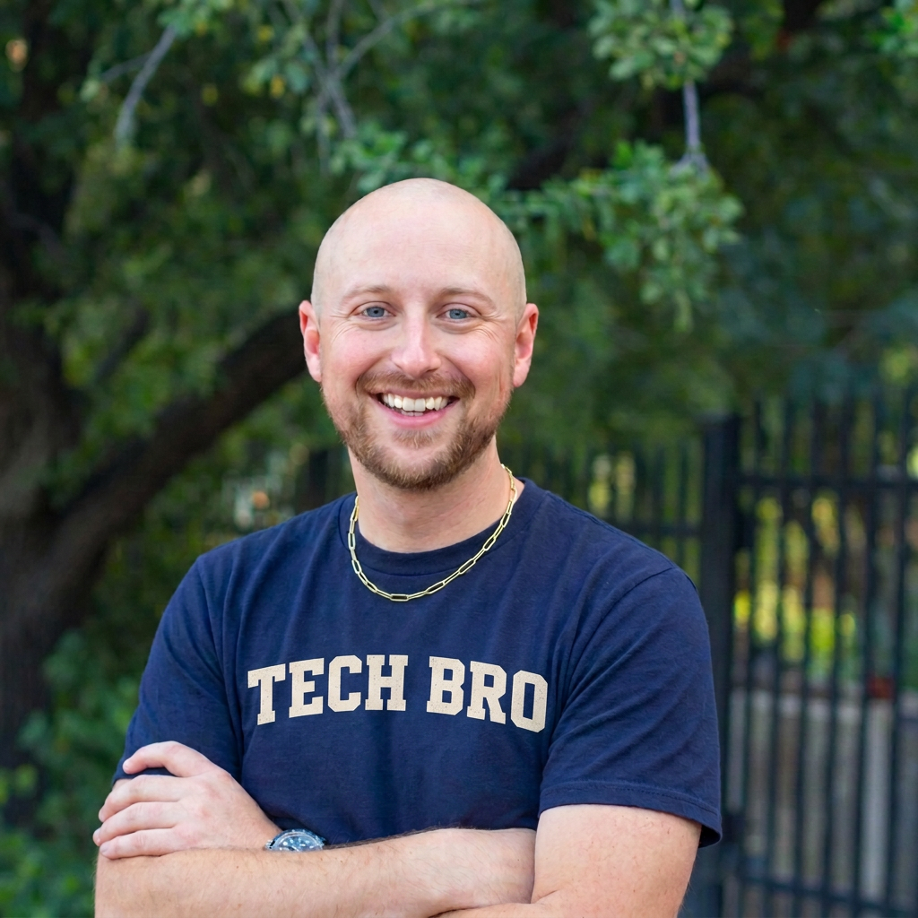 Forbes Shannon smiling in a navy TECH BRO tee